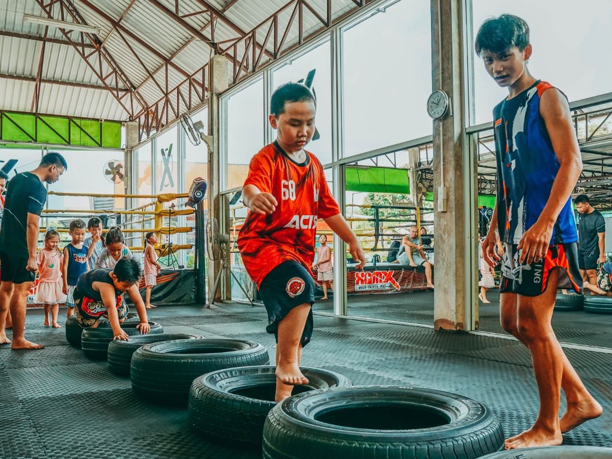 Kids are working out on the wheel drills to improve footwork.