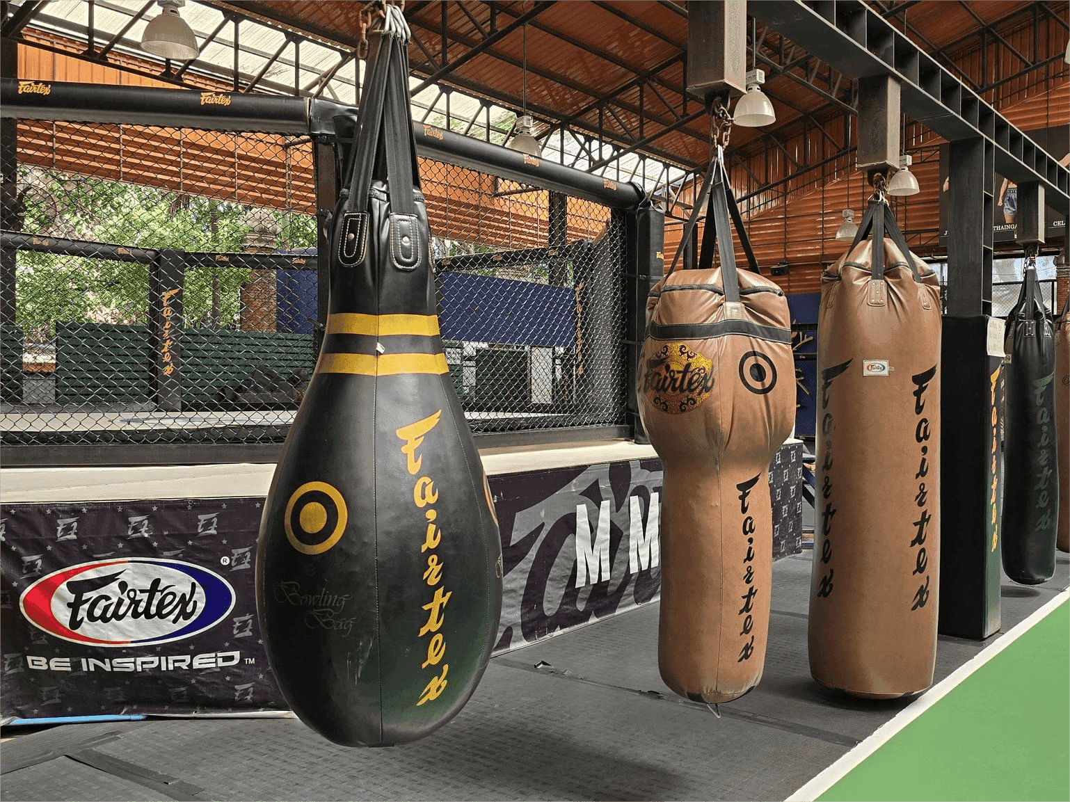 Fairtex is one of the largest manufacturers of martial arts equipment in Thailand. Sandbags at the Fairtex Training Center in Pattaya.